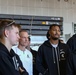 Michigan State University basketball players tour USS Abraham Lincoln