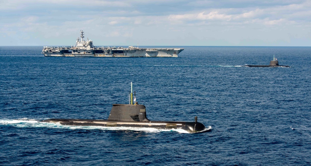 USS Ronald Reagan (CVN 76) steams in formation with allies during Malabar 2022