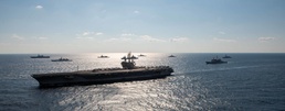 USS Ronald Reagan (CVN 76) steams in formation with allies during Malabar 2022