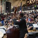 The U.S. Navy Band Commodores perform at Ovey Comeaux High School in Lafayette, Louisiana.