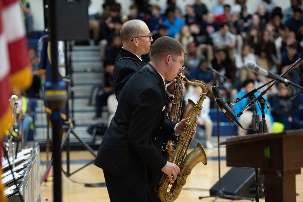 The U.S. Navy Band Commodores perform at Ovey Comeaux High School in Lafayette, Louisiana.