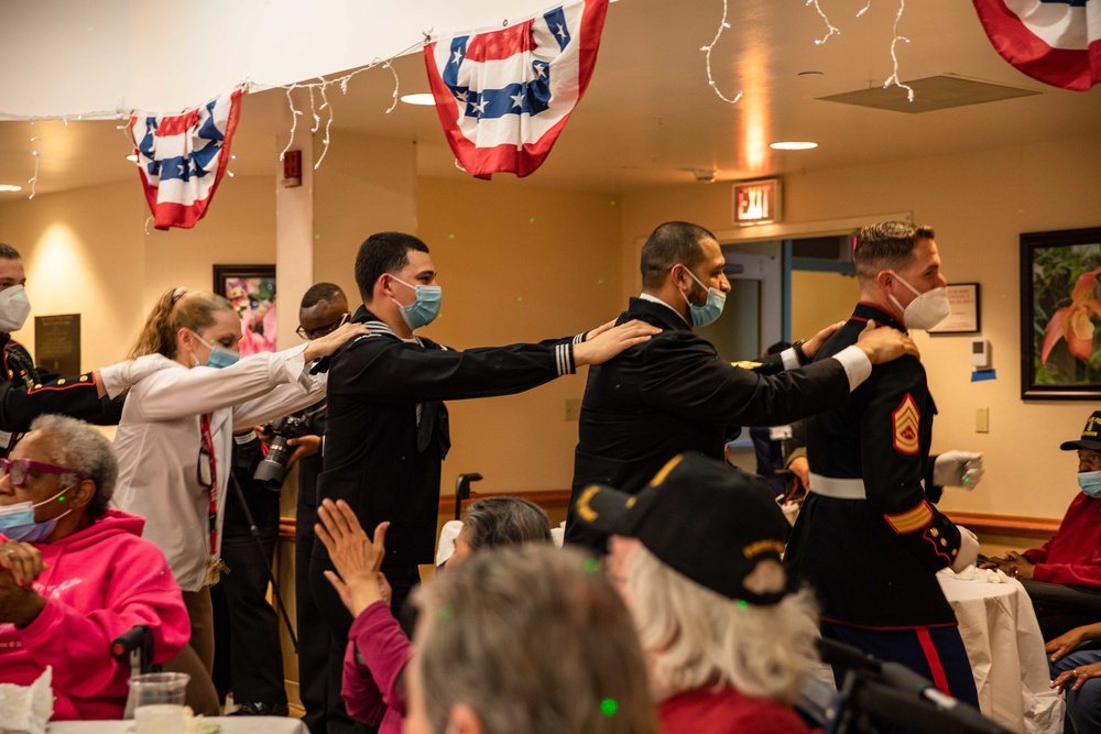 Sailors and Marines visit veterans at the New York Veterans Home