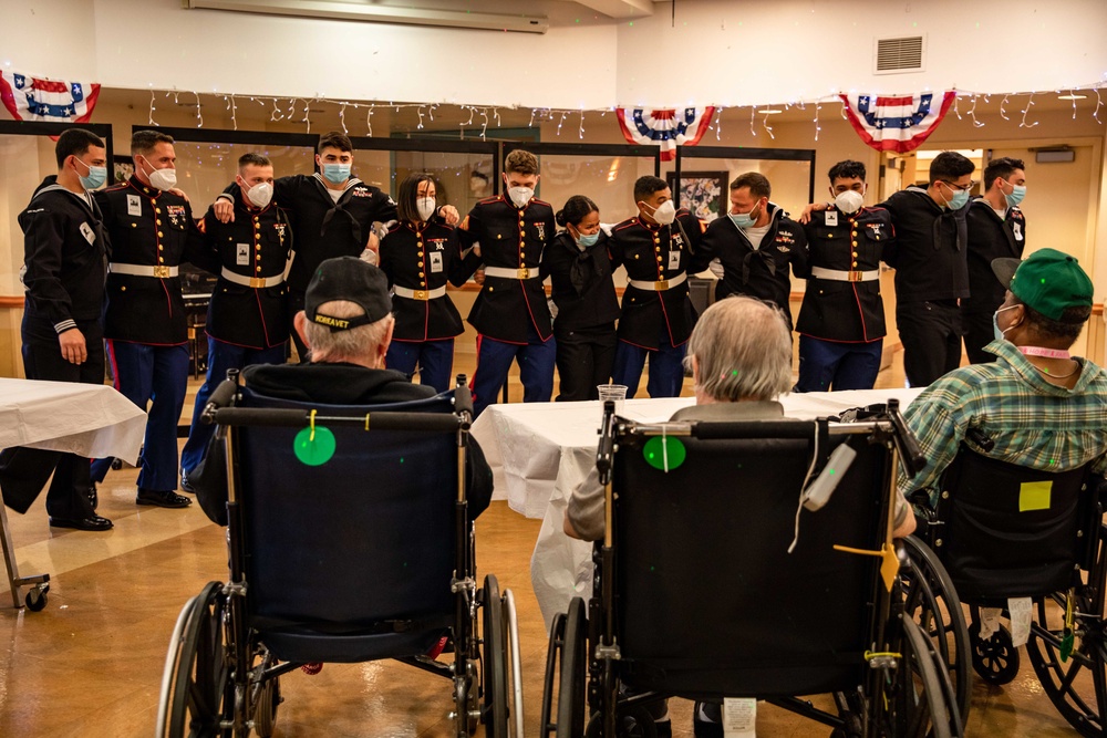 Sailors and Marines visit veterans at the New York Veterans Home