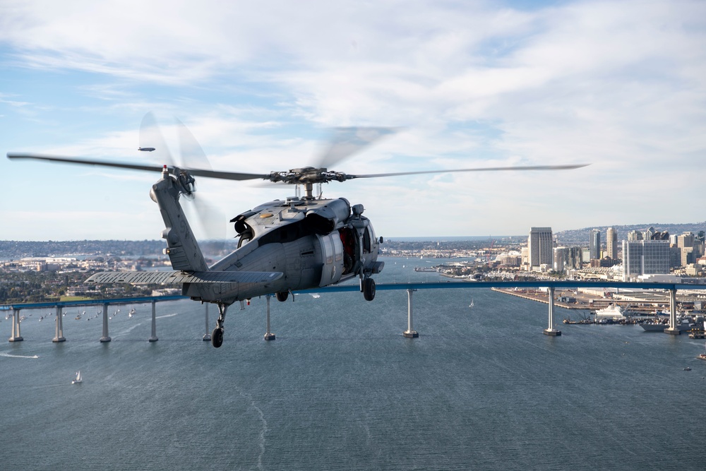 HSC-3 &quot;Merlins&quot; Flyover USS Abraham Abraham Lincoln (CVN 72) During Armed Forces Classic, Carrier Edition 2022