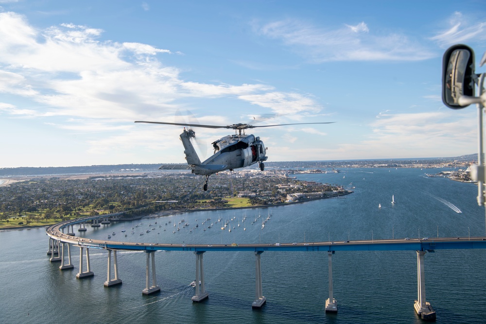 HSC-3 &quot;Merlins&quot; Flyover USS Abraham Abraham Lincoln (CVN 72) During Armed Forces Classic, Carrier Edition 2022