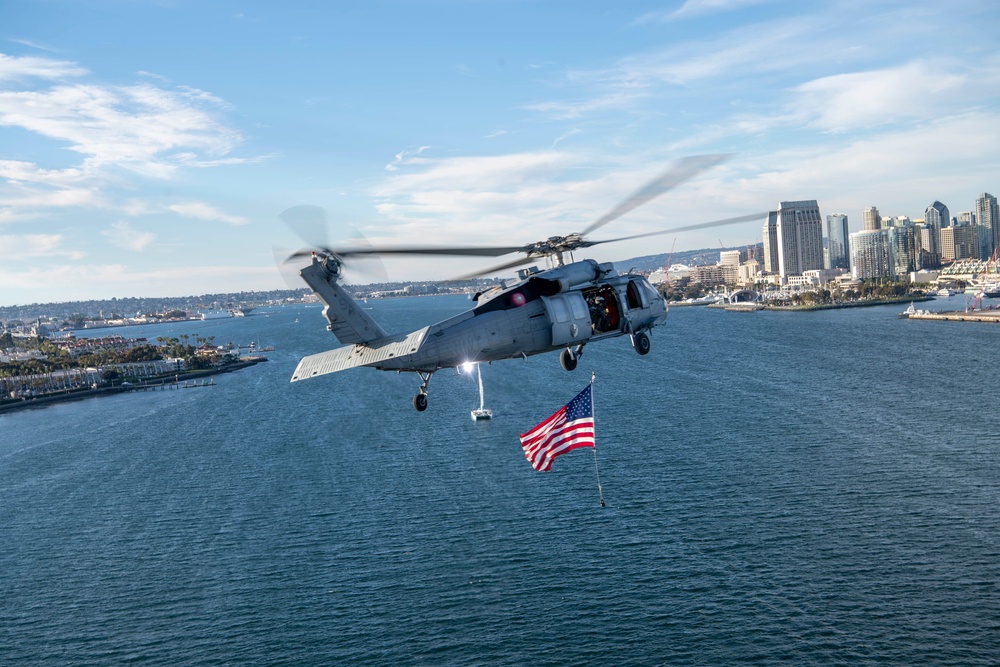 HSC-3 &quot;Merlins&quot; Flyover USS Abraham Abraham Lincoln (CVN 72) During Armed Forces Classic, Carrier Edition 2022