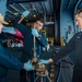 USS Ronald Reagan (CVN 76) Sailors conduct maintenance on hangar bay door