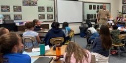 Servicemembers stationed at Naval Medical Leader and Professional Development Command visited local schools on Veterans Day