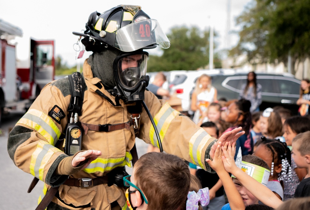 Sparky visits for MacDill Fire Prevention Week