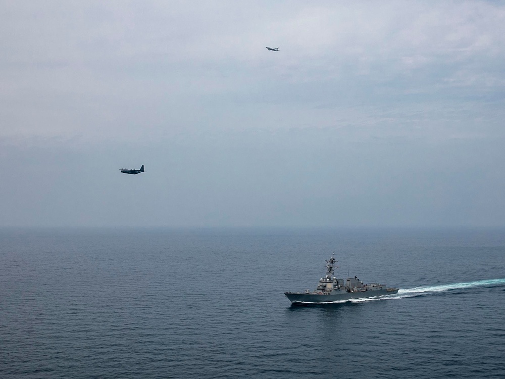 USS Delbert D. Black Operates with AC-130J and P-8A