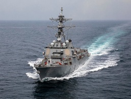 USS Delbert D. Black Operates with AC-130J and P-8A