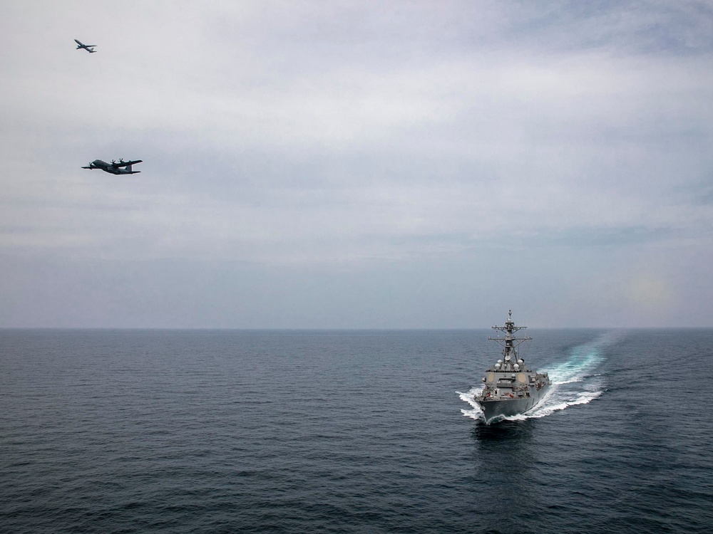 USS Delbert D. Black Operates with AC-130J and P-8A