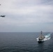 USS Delbert D. Black Operates with AC-130J and P-8A