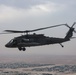 Task Force Mustang UH-60 Blackhawk and AH-64 Apache Flight Crews, land on the U.S.S. Lewis B. Puller