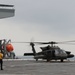 Task Force Mustang UH-60 Black Hawk and AH-64 Apache Flight Crews, land on the USS Lewis B. Puller