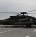 Task Force Mustang UH-60 Black Hawk and AH-64 Apache Flight Crews, land on the USS Lewis B. Puller