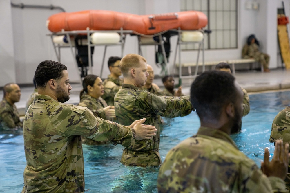 Soldiers try out water survival training at the Vandal Training Center