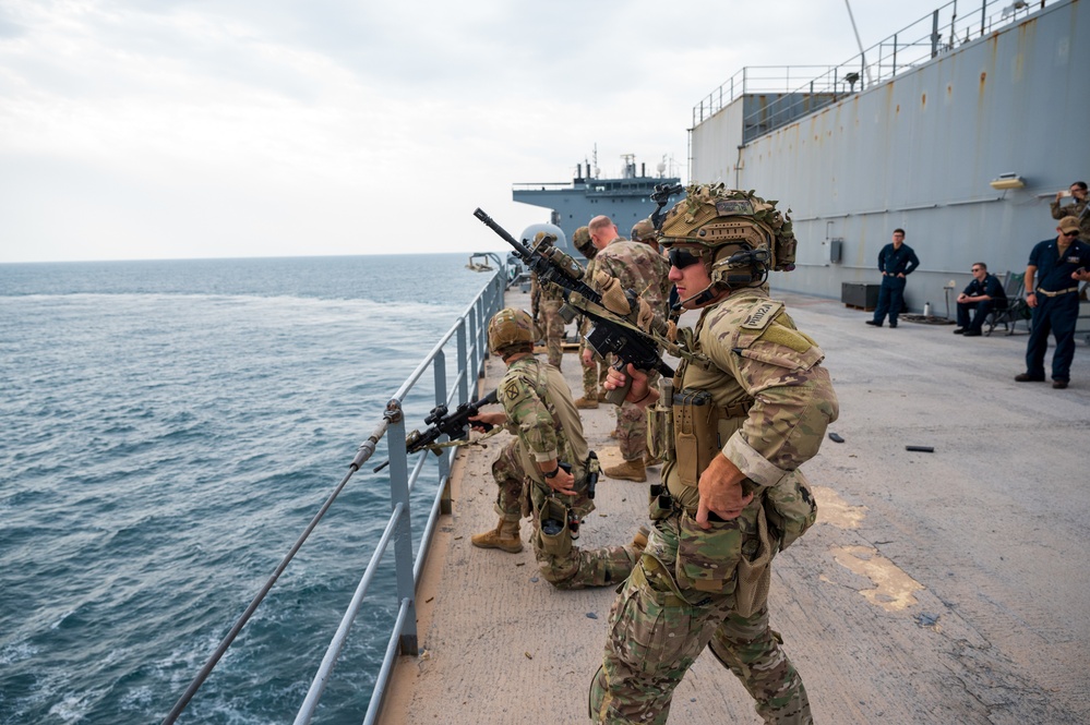 1st Brigade Combat Team, 10th Mountain Division, travel to USS Lewis B. Puller to conduct marksmanship at sea