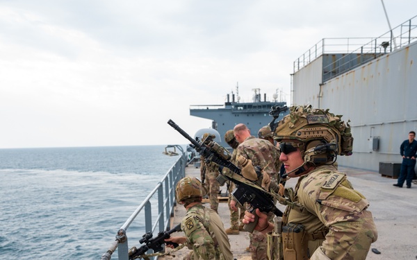 1st Brigade Combat Team, 10th Mountain Division, travel to USS Lewis B. Puller to conduct marksmanship at sea