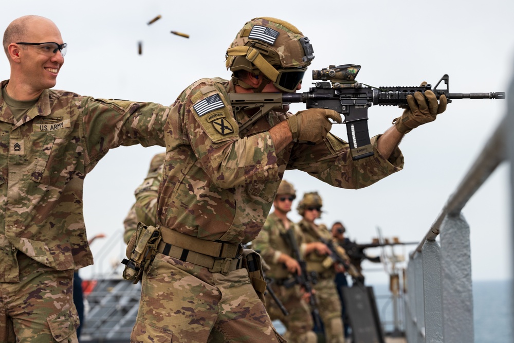 1st Brigade Combat Team, 10th Mountain Division, travel to USS Lewis B. Puller to conduct marksmanship at sea
