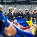 USS Arlington Sailors and Marines participate in pregame ceremonies