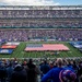 USS Arlington Sailors and Marines participate in pregame ceremonies