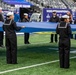 USS Arlington Sailors and Marines participate in pregame ceremonies