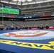 USS Arlington Sailors and Marines participate in pregame ceremonies