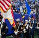 USS Arlington Sailors and Marines participate in pregame ceremonies