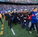 USS Arlington Sailors and Marines participate in pregame ceremonies