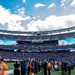 USS Arlington Sailors and Marines participate in pregame ceremonies