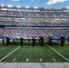 USS Arlington Sailors and Marines participate in pregame ceremonies