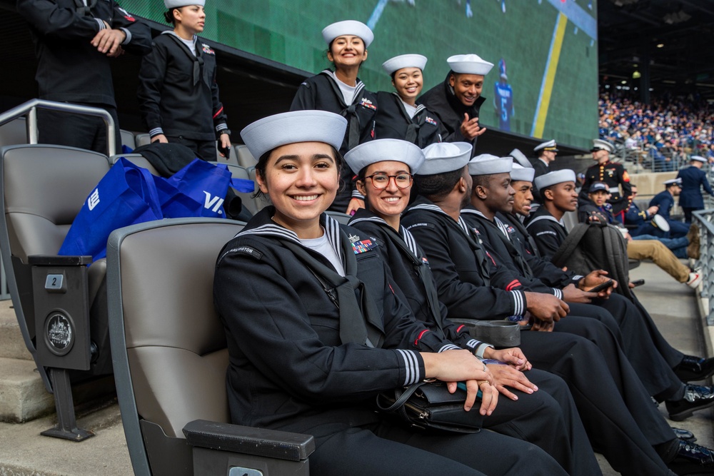 USS Arlington Sailors and Marines participate in pregame ceremonies