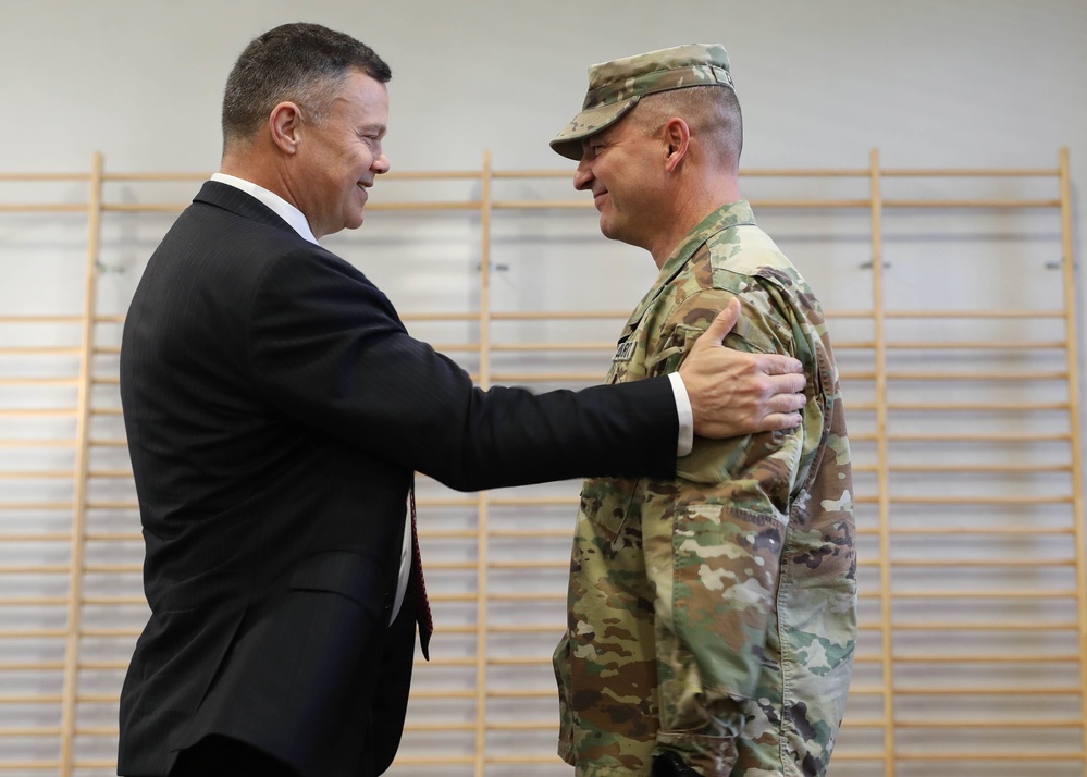 Area Support Group Poland Change Patches During Ceremony