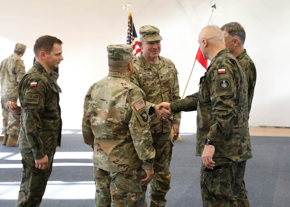 Area Support Group Poland Change Patches During Ceremony