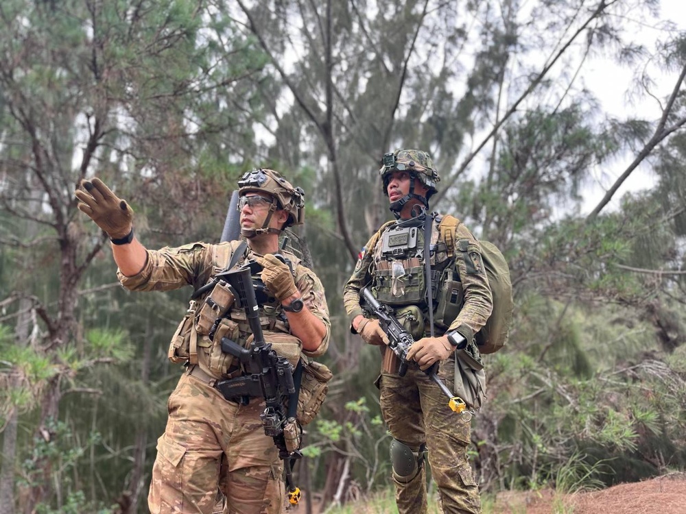 SFAB Advisor Discusses Tactical Ground Maneuvers with Philippine Army Soldier