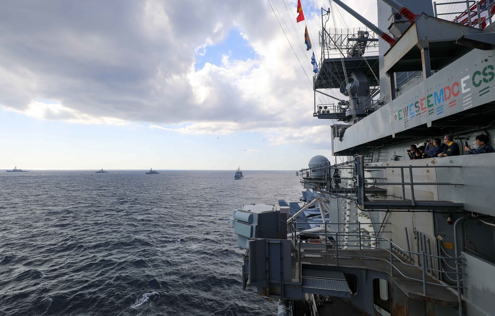 Commander, Destroyer Squadron 15 Sailors with Sailors from RAN, Indian Navy and JMSDF during Malabar 2022