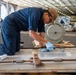 USS Carl Vinson (CVN 70) Sailor Conducts Maintenance