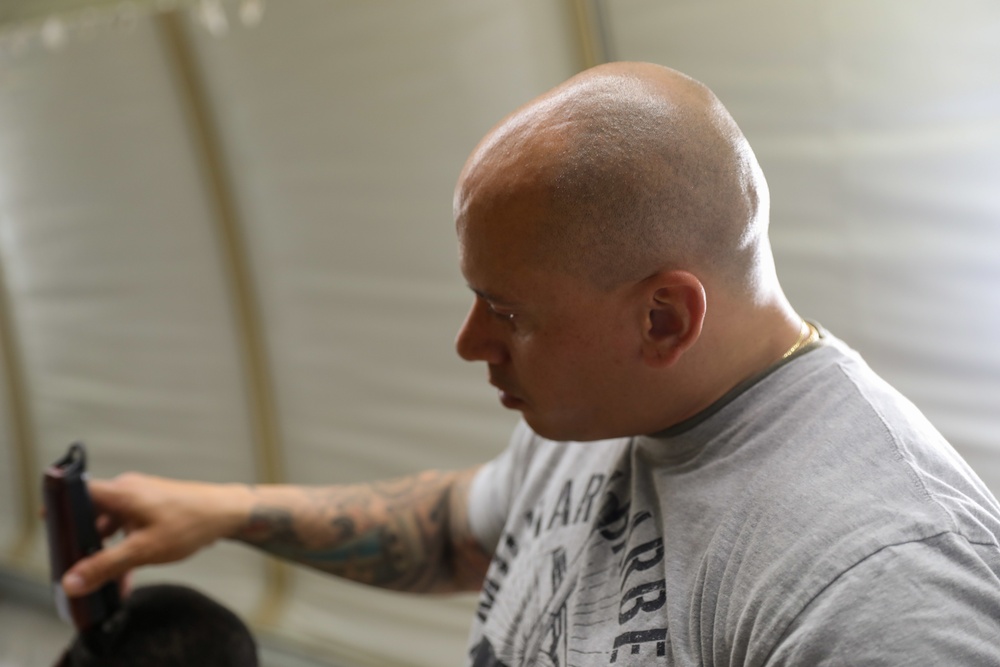 The world of barbering helps one Sergeant with the 369th Sustainment Brigade lead Soldiers