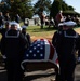 Funeral Honors detail carries the casket carrying the remains of Radioman 3rd Class Charles Montgomery