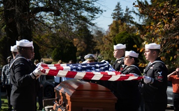 Funeral Honors detail prepares to fold the National Ensign
