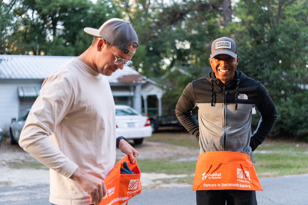 Airmen volunteer with local Habitat for Humanity