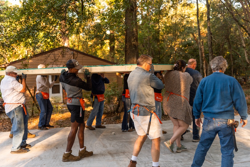 Airmen volunteer with local Habitat for Humanity