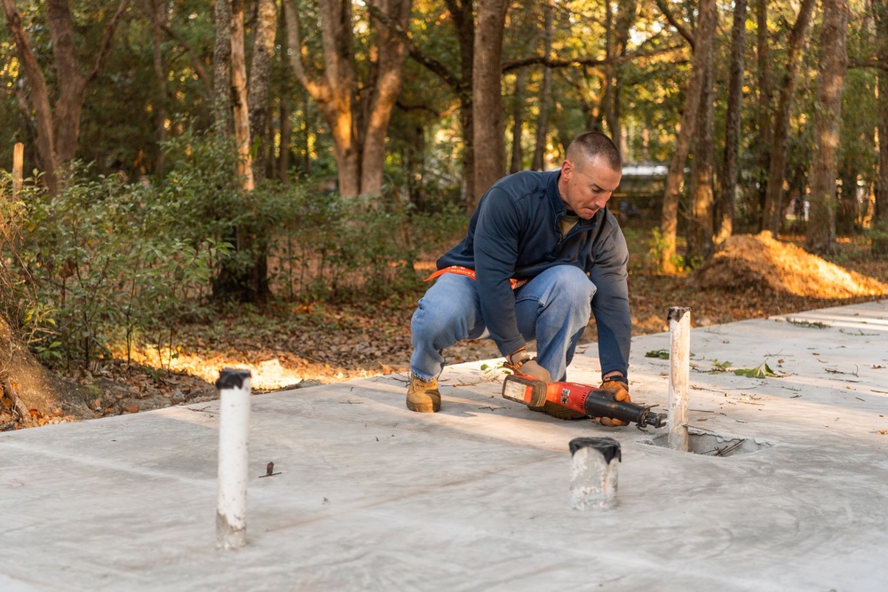 Airmen volunteer with local Habitat for Humanity
