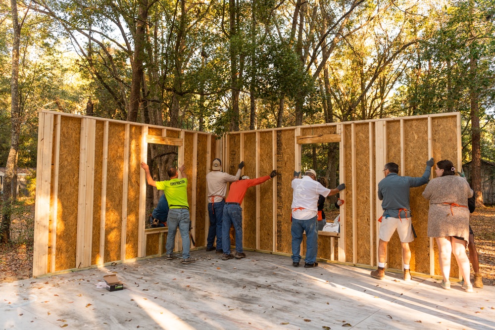Airmen volunteer with local Habitat for Humanity