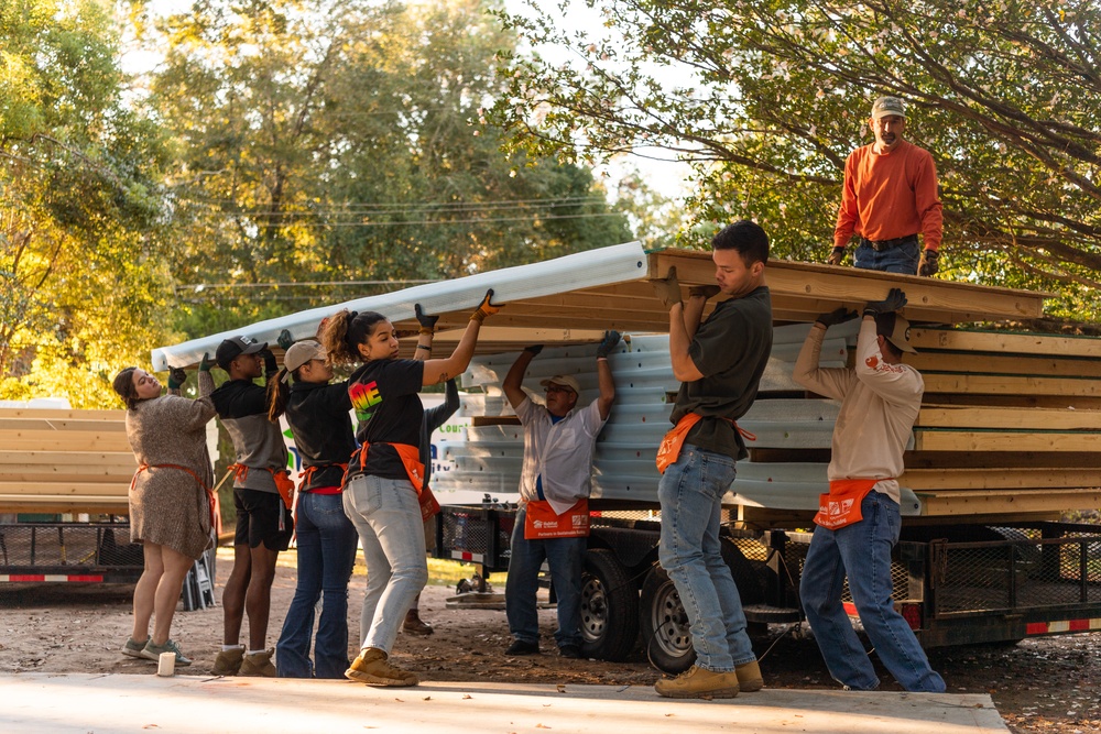 Airmen volunteer with local Habitat for Humanity