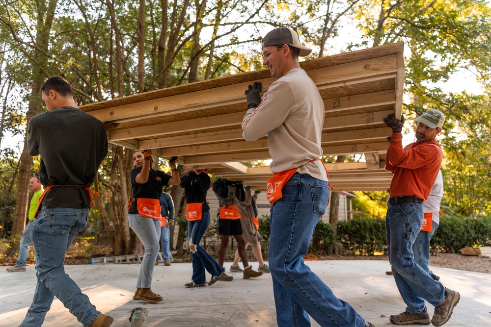 Airmen volunteer with local Habitat for Humanity