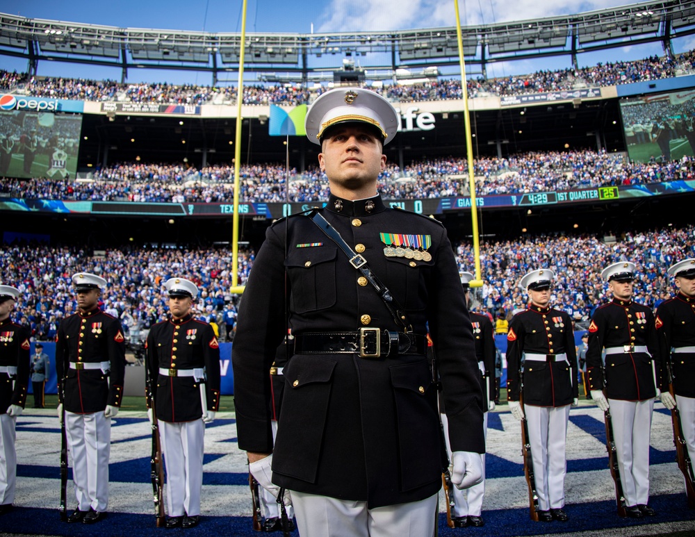 Marines with the Silent Drill Platoon perform over Veteran's Weekend