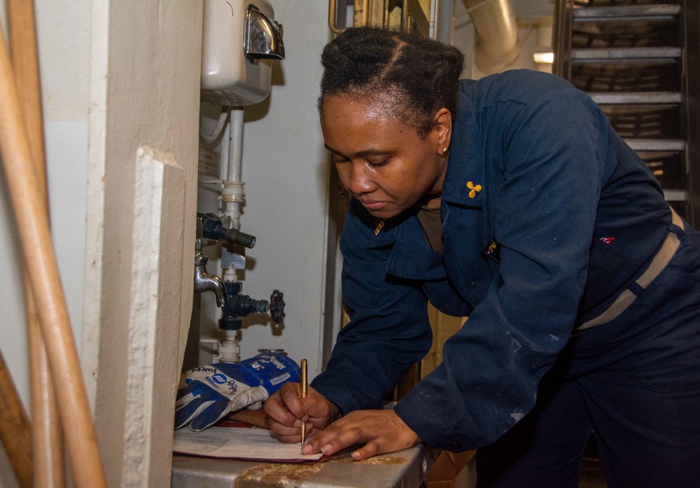 USS Ronald Reagan (CVN 76) Sailors repair CHT system