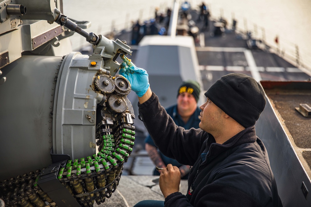 USS Paul Ignatius (DDG 117) Sailors Conduct Maintenance on CIWS